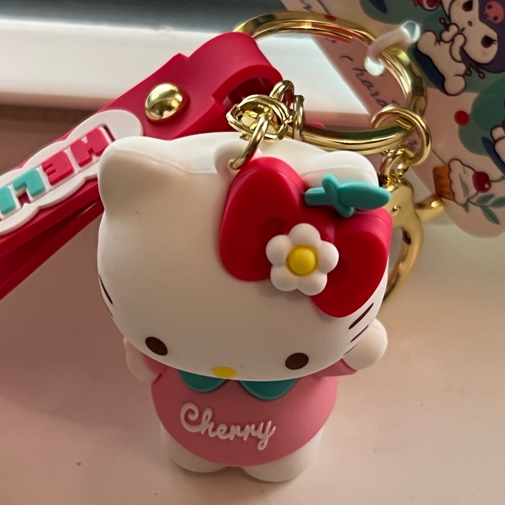 Hello Kitty Pink and Red Bag with Gold-Toned Accents
